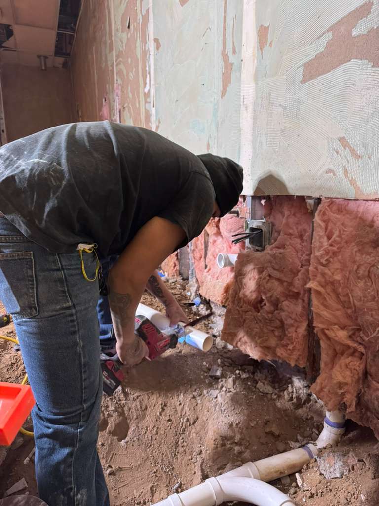 Norse Mechanical team is hard at work installing underground drain lines and setting rough-ins. Commercial Plumbing Services MN