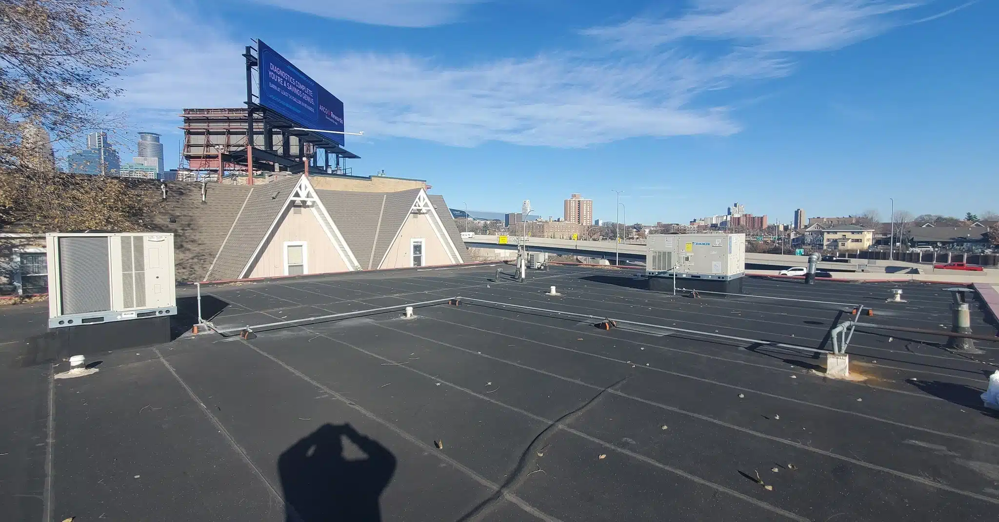 Norse Mechanical working on rooftop ac units for commercial buildings