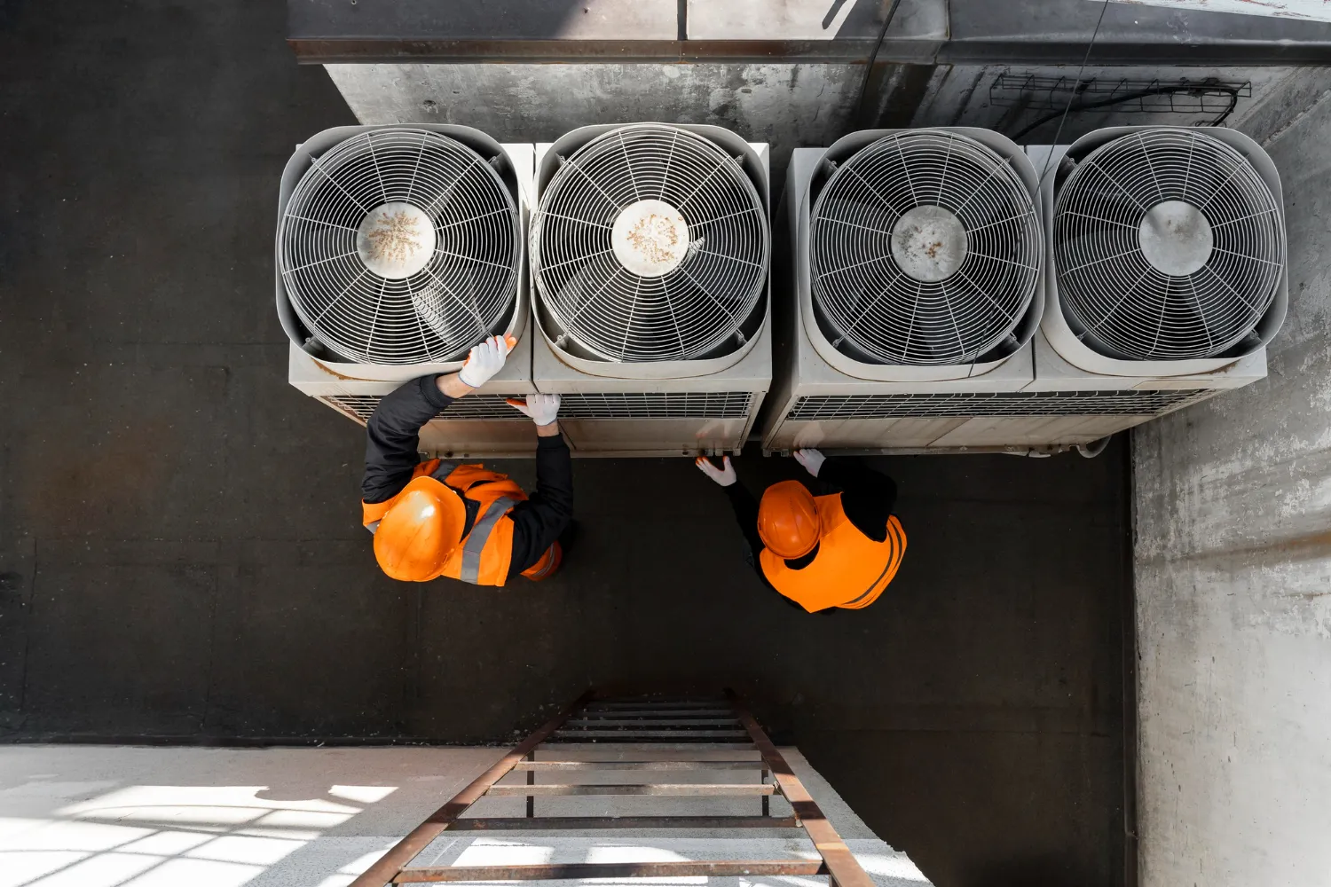 Technician working on a commercial ac unit